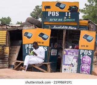 A Man Sits Outside His POS Business Shop In Kastina, NIGERIA, On July 28, 2022. Everyday Life In Northern Region, Nigeria