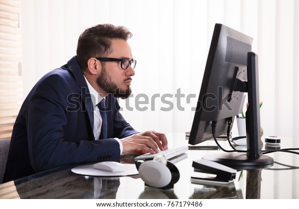 Man Sitting Bad Posture Working On Stock Photo Edit Now 767179486