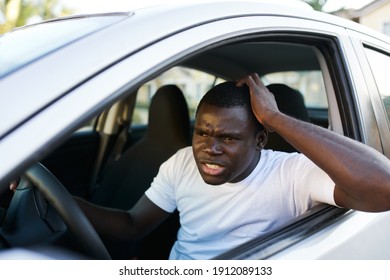 Man sitting behind the wheel of a car trip lifestyle