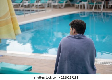 Man Sitting By The Pool, Wrapped In Towel,outdoor Photography Summer Theme