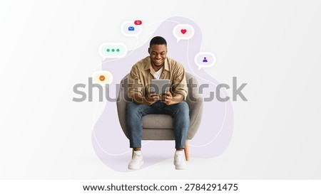 Man Sitting in Chair Using Tablet While Interacting With Social Media Icons