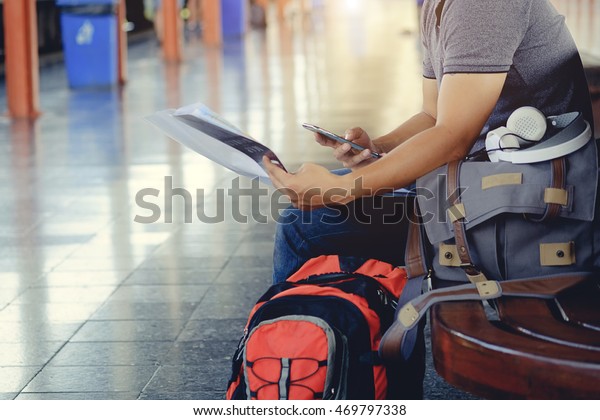 Man Sitting Map Smartphone Travel Bag Stock Photo Edit Now 469797338