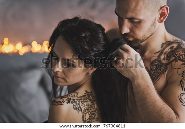 Man Sitting On Bed Stroking Long Stock Photo Edit Now 767304811