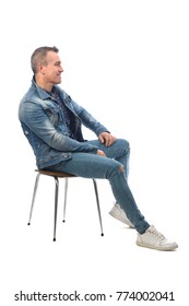 Man Sitting On A Chair With White Background