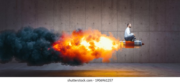 Man Sitting On A Rocket With Flames And Smoke. Concept Of Success And Determination.