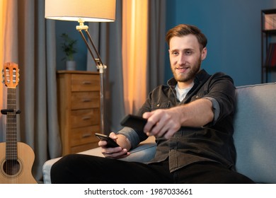 524 Watching Tv While On Phone Images, Stock Photos & Vectors 