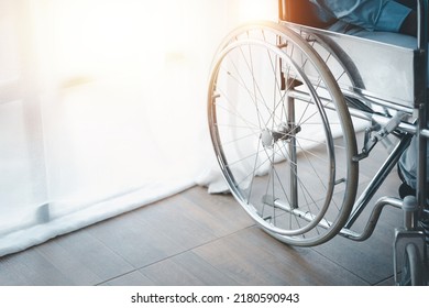 Man Sitting On A Wheelchair, Man With A Wheelchair At Company Office, Recruiting People With Disabilities To Work, Working With A Team In The Company And Having A Disabled Person As Part Of The Team.