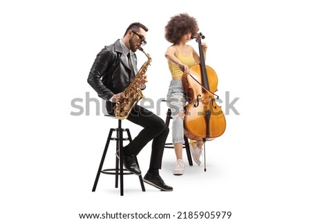 Man sitting and playing a saxophone and a woman playing a cello isolated on white background