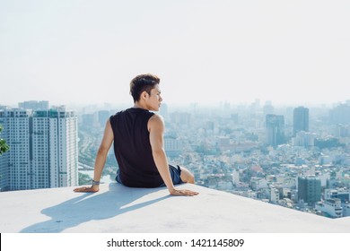 Man Sitting Rest Rooftop Concept - Powered by Shutterstock