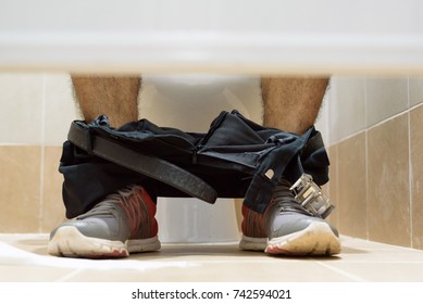 Man Sitting In Toilet.Diarrhea Concept.