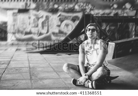 Similar – Man with sun hat and sunglasses on an old bridge