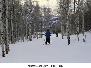 Man Skiing Between Aspen Trees; In Snowmass, Colorado