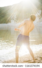 Man Skipping Rocks Beach