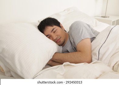 Man sleeping - Shutterstock ID 292450313