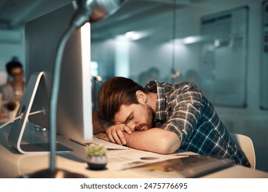 Man, sleeping and computer in night at office with rest, deadline and burnout at copywriting startup. Person, writer and editor with fatigue, overworked tired by pc in workplace at creative agency - Powered by Shutterstock