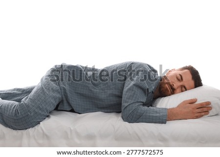 Man sleeping on bed against white background