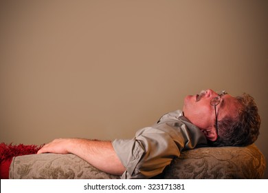 Man Sleeping On The Couch