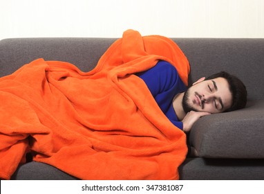 Man Sleeping On The Couch