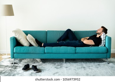 Man Sleeping On The Sofa