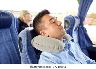 Man Sleeping In Travel Bus With Cervical Pillow