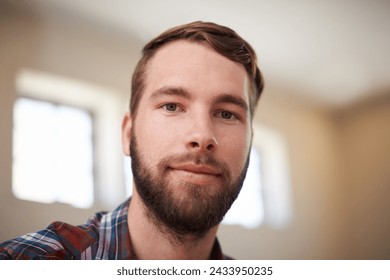 Man, smile and face for selfie, happy and relax at home or indoor on weekend and alone. Young person, attractive or handsome for unwind, rest or chill in apartment or loft inside South Africa - Powered by Shutterstock