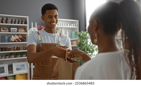 Man smiling assisting woman with purchase in home decor store - Powered by Shutterstock