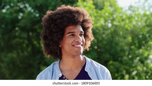 Man smiling happy portrait outdoor in sunny day in vineyard or green nature ecologic environment. Close shot.Friends italian trip  - Powered by Shutterstock