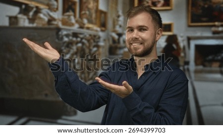 Man smiling and presenting with open hands gesture inside ornate church building with paintings and sculptures; serenity.