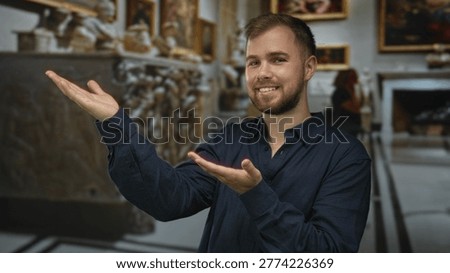 Man smiling and presenting with open hands gesture inside ornate church building with paintings and sculptures; serenity.