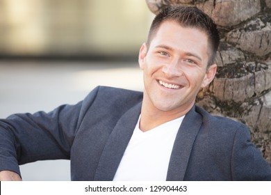 Man Smiling And Wearing A Sport Coat