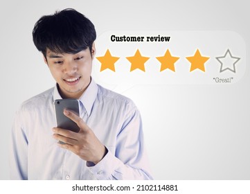 Man Smilling With Smart Phone, Customer Review By Rating Stars, Customers Giving Feedback, Shopping Online And Evaluation Concept, Business Assessment