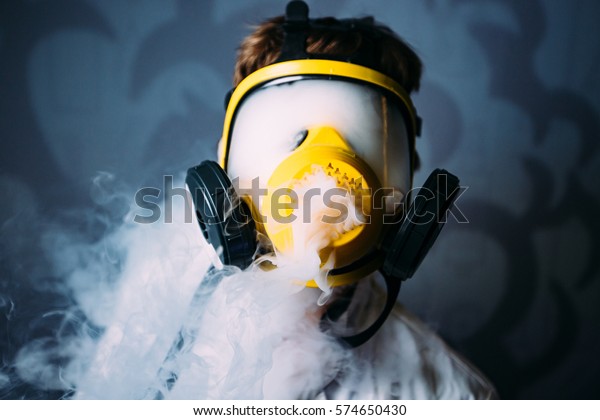 Download Man Smoke Vape Yellow Gasmask Full People Stock Image 574650430 PSD Mockup Templates