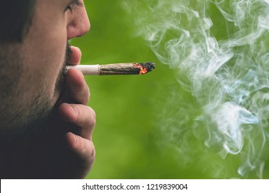 Man Smoking Cannabis Joint