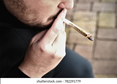 Man Smoking Cannabis Joint