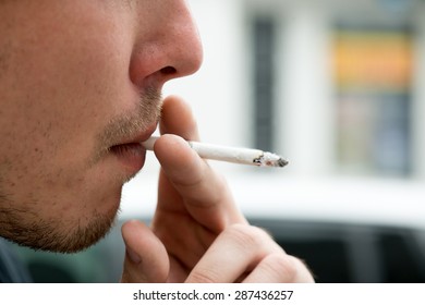 Man Smoking Cigarette