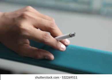 Man Smoking A Cigarette 