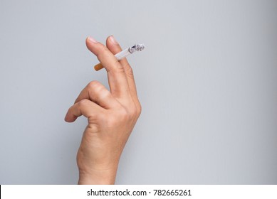 Man Smoking A Cigarette