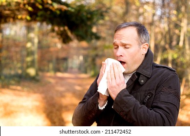 Man Is Sneezing