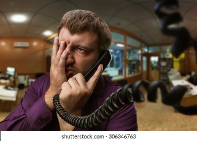 Man Speaks On The Phone