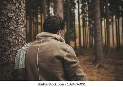 Man spending time alone in the forest
