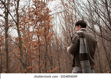 Man spending time alone in the forest