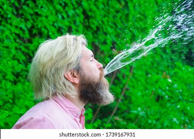 spitting out water