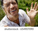 Man splashed with water