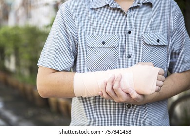 Man With Splint Broken Bone Right Wrist.