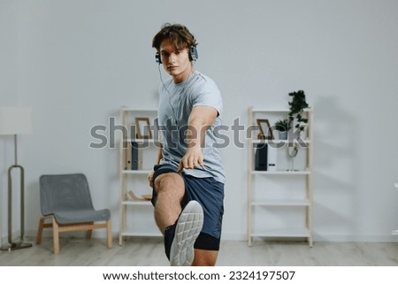 man sport headphone home indoor activity lifestyle tutorial training gray healthy