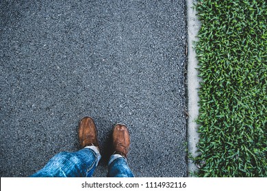 Man Stand On Side Walk And Shade Of Shadow