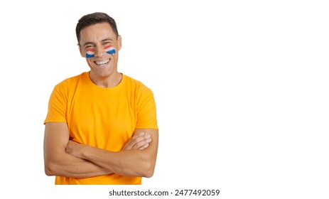 Man standing with dutch flag painted on face smiling - Powered by Shutterstock