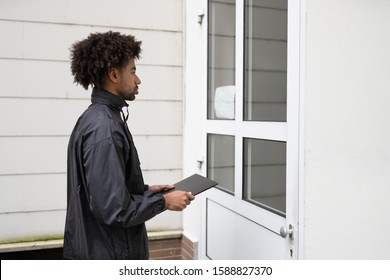 Man Standing At The Entrance Of The House Waiting For Owner To Open Door - Shutterstock ID 1588827370