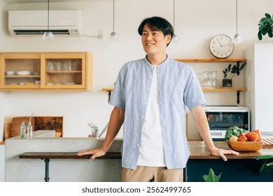 Man standing in front of kitchen