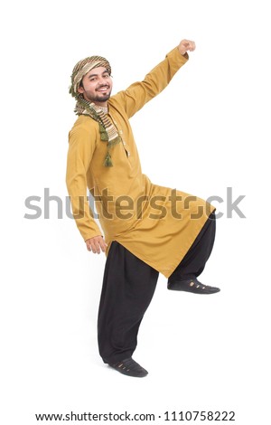 Man standing and hand up like a super boy and trying to fly, wearing kameez shalwar. Eid look. isolated on white background Eid mubarak offer.